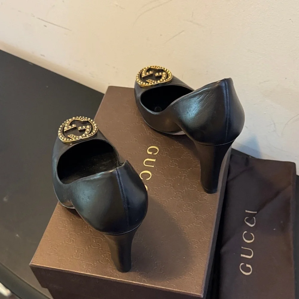 Gucci Black Heels with Iconic Gucci Gold Emblem